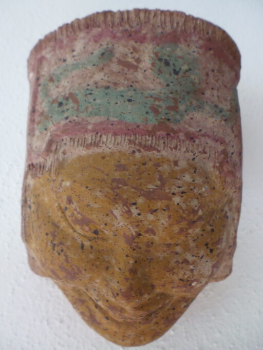 Oud masker lachende man