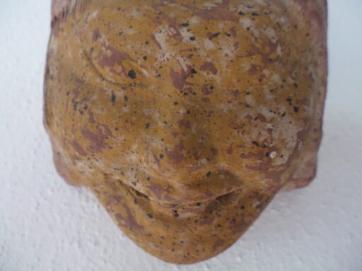 Oud masker lachende man