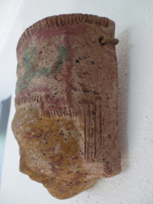 Oud masker lachende man