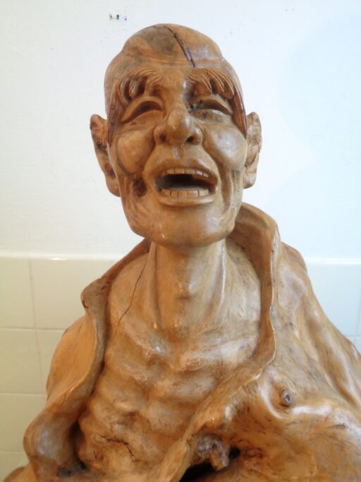 Aziatisch beeld wortelhout