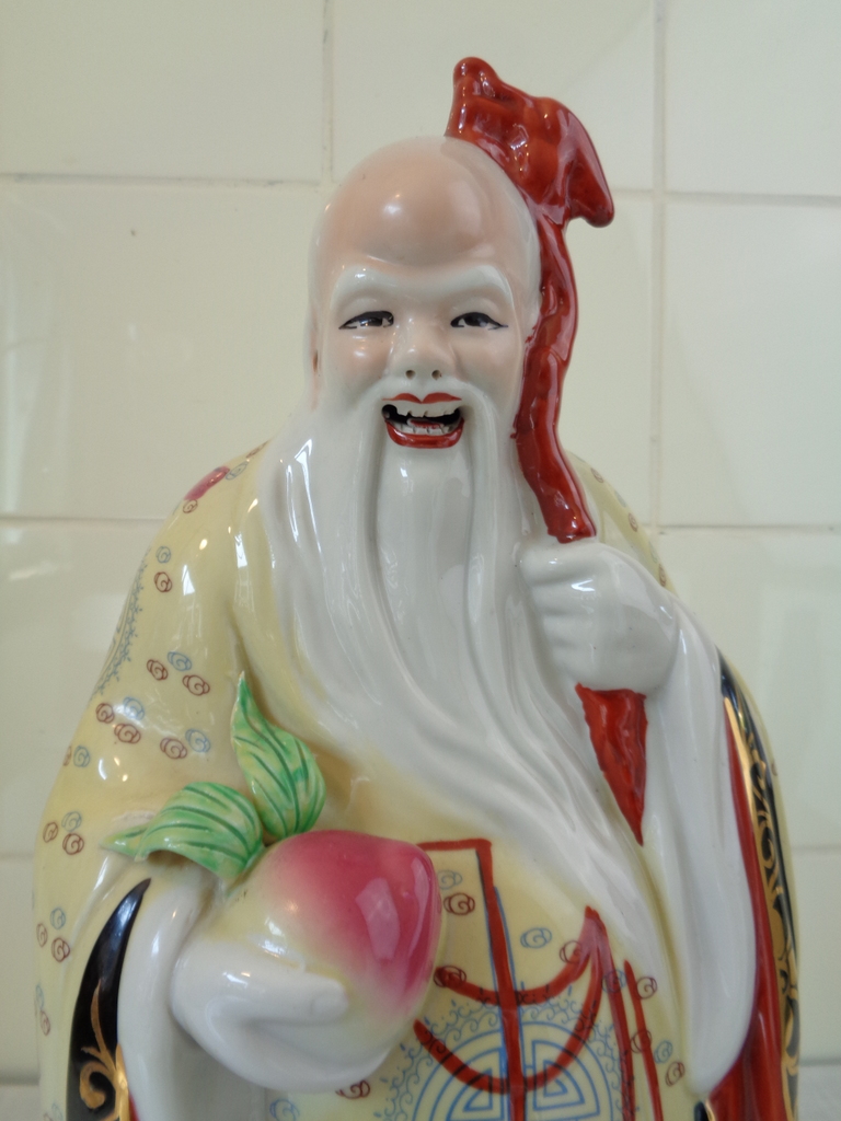 Porseleinen beeld Chinese oude man