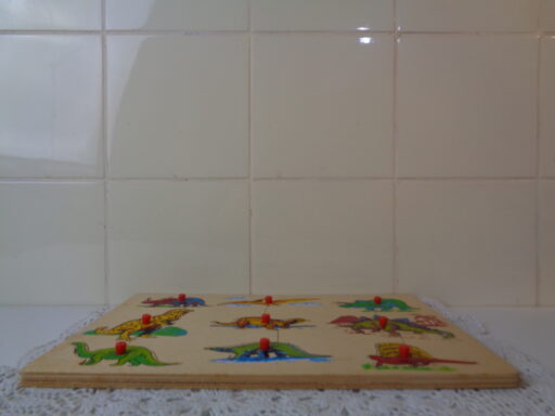 Houten puzzels Sesamstraat en Dinosaurussen