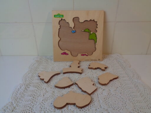 Houten puzzels Sesamstraat en Dinosaurussen