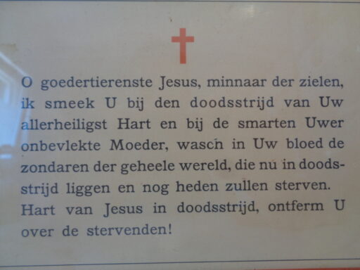 Twee religieuze teksten in houten omlijstingen