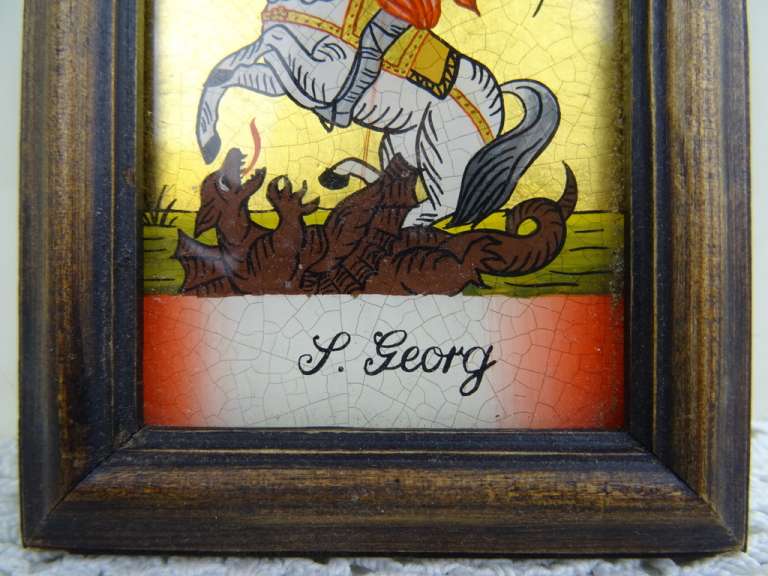 Icoon Sint Joris en de draak geschilderd achter glas