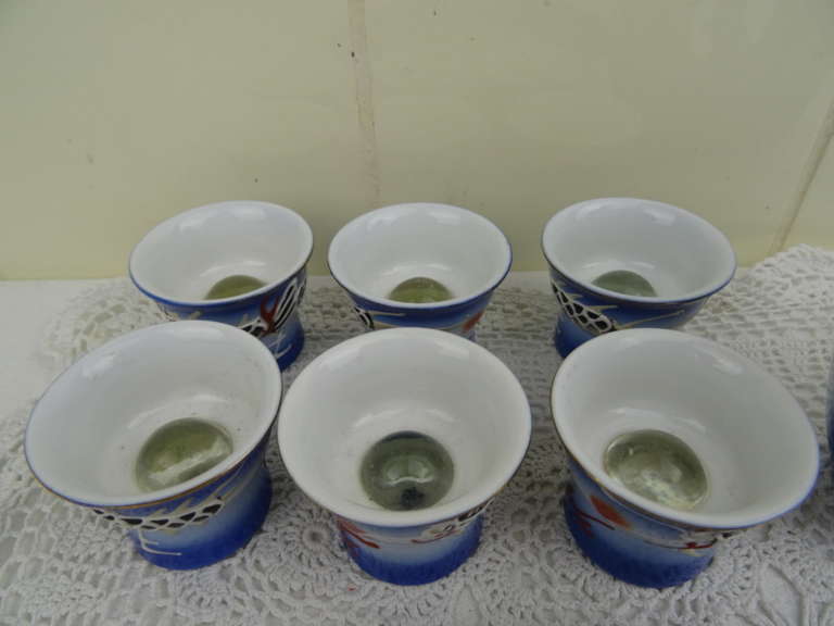 Japanse sake-glaasjes met verborgen naakt