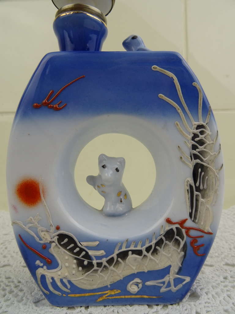 Japanse sake-glaasjes met verborgen naakt