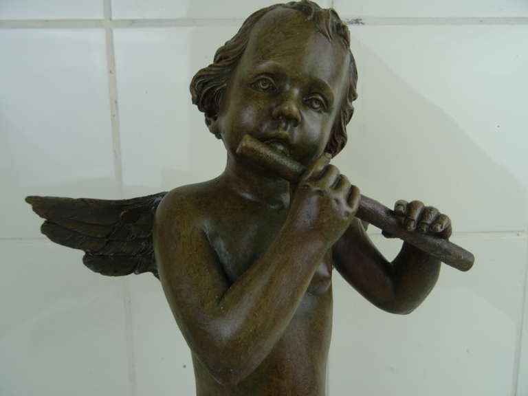 Beeld engel met fluit