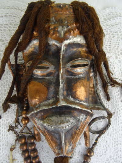 Afrikaans koperen masker