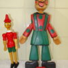 Twee houten Pinokkio poppen