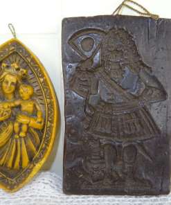 Antieke wassen devotie objecten