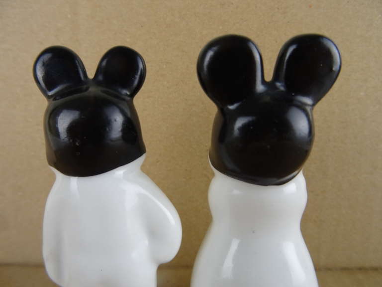 Antieke beeldjes Mickey en Minnie Mouse
