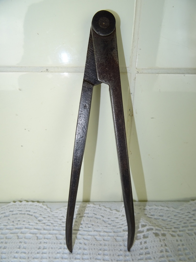 Antieke metaalpasser