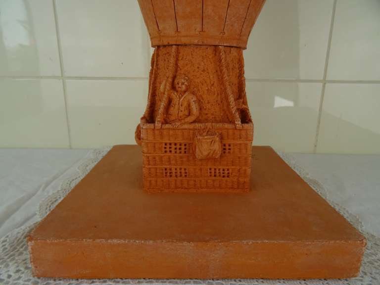 Terracotta beeld L’Archimède door Constant Grooten