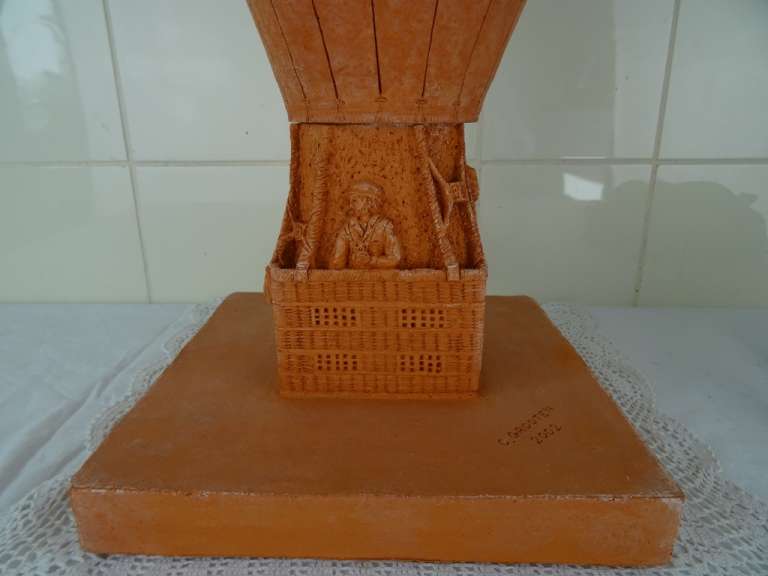 Terracotta beeld L’Archimède door Constant Grooten