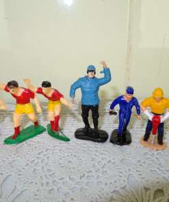 Collectie van 7 miniatuur popjes