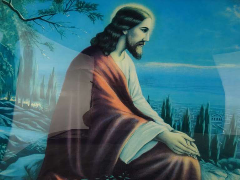Antiek kunstwerk Jezus Christus bij nacht