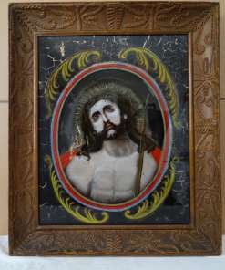 Antieke schildering achter glas Jezus