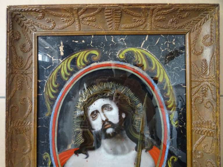 Antiek schilderij achter glas Jezus