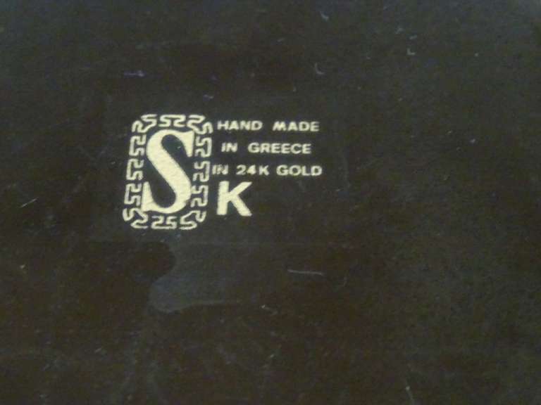 Collectie vintage 24K Griekse vazen en servies
