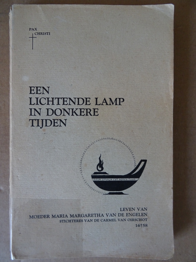 Pax Christi J.M. + J.T. Een lichtende lamp in donkere tijden