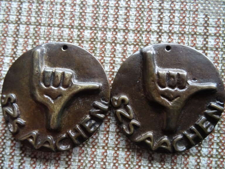 Bronzen plaquette met Shaka teken SZS Aachen