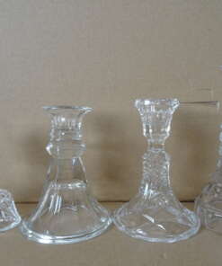 Collectie kandelaars van kristal en glas