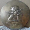 Antiek bronzen reliëf Paul Brandt met cherubijn 14cm