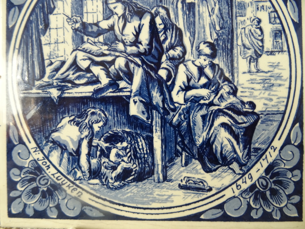 Delfts blauwe tegel De kleermaaker Delfts blauwe tegel De kleermaaker
