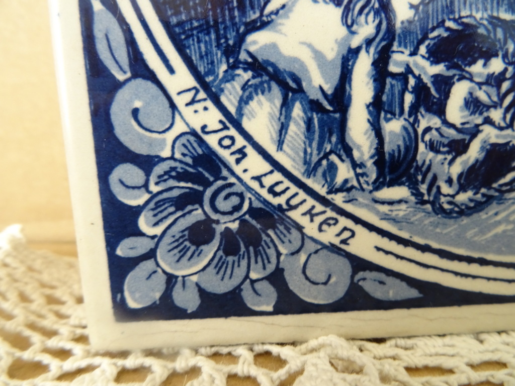 Delfts blauwe tegel De kleermaaker Delfts blauwe tegel De kleermaaker