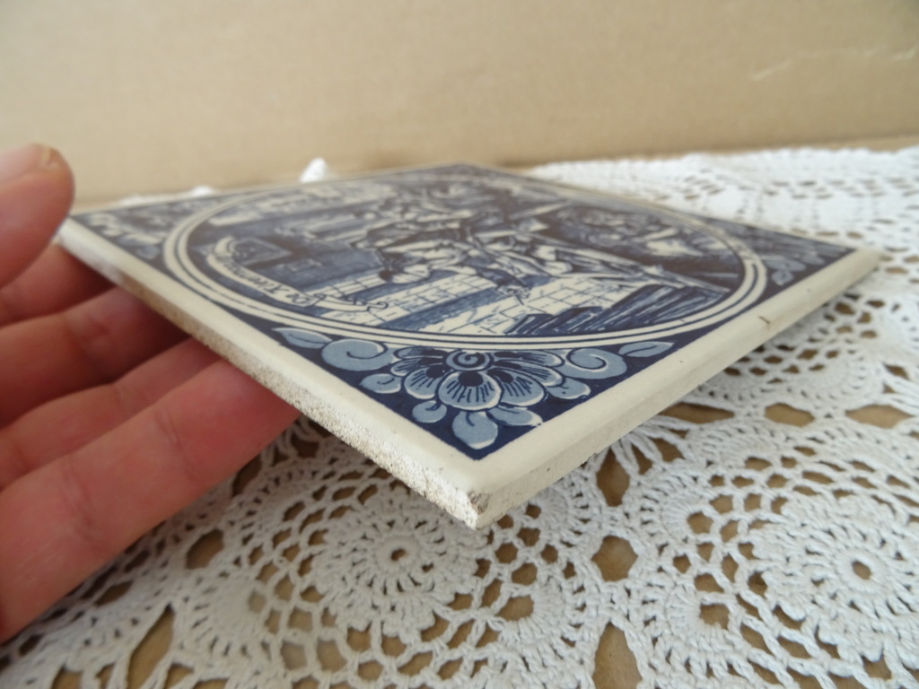 Delfts blauwe tegel De kleermaaker Delfts blauwe tegel De kleermaaker