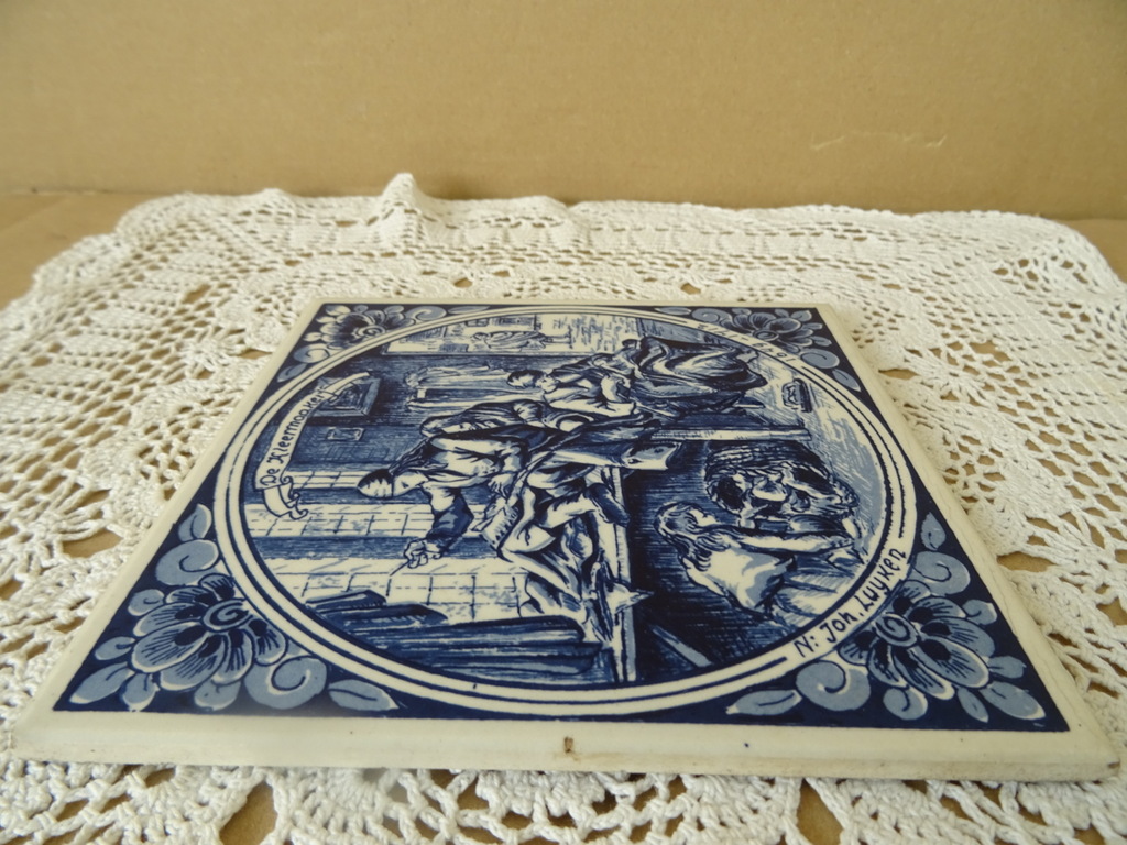 Delfts blauwe tegel De kleermaaker Delfts blauwe tegel De kleermaaker