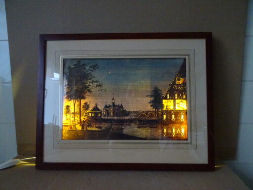 Antieke ets of opticaprent met verlichting De Leidsepoort te Amsterdam