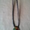 Afrikaanse amulet ketting met kauri schelp volkskunst
