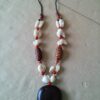 Afrikaanse amulet ketting met kauri schelpen volkskunst